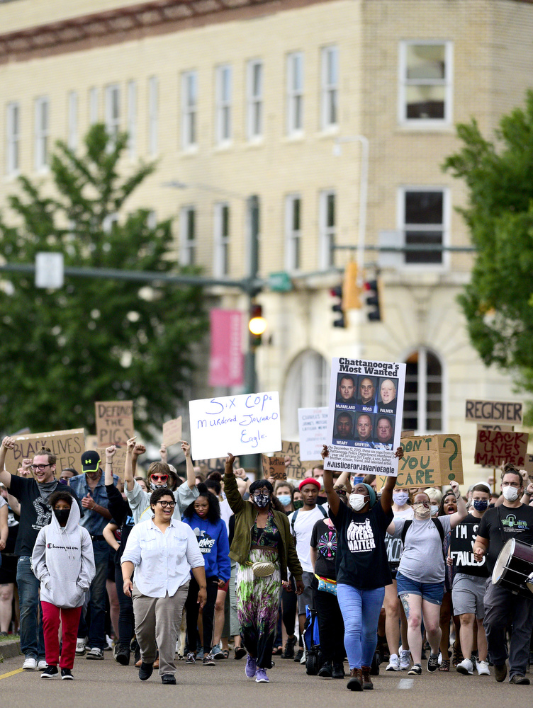 Staff Photo by Robin Rudd / The march moves south down Market Street toward the Southside. Protesters gathered at Miller Park and marched south past some of Chattanooga's tourism icons in reaction to the killing of George Floyd and other police brutalities on June 17, 2020.