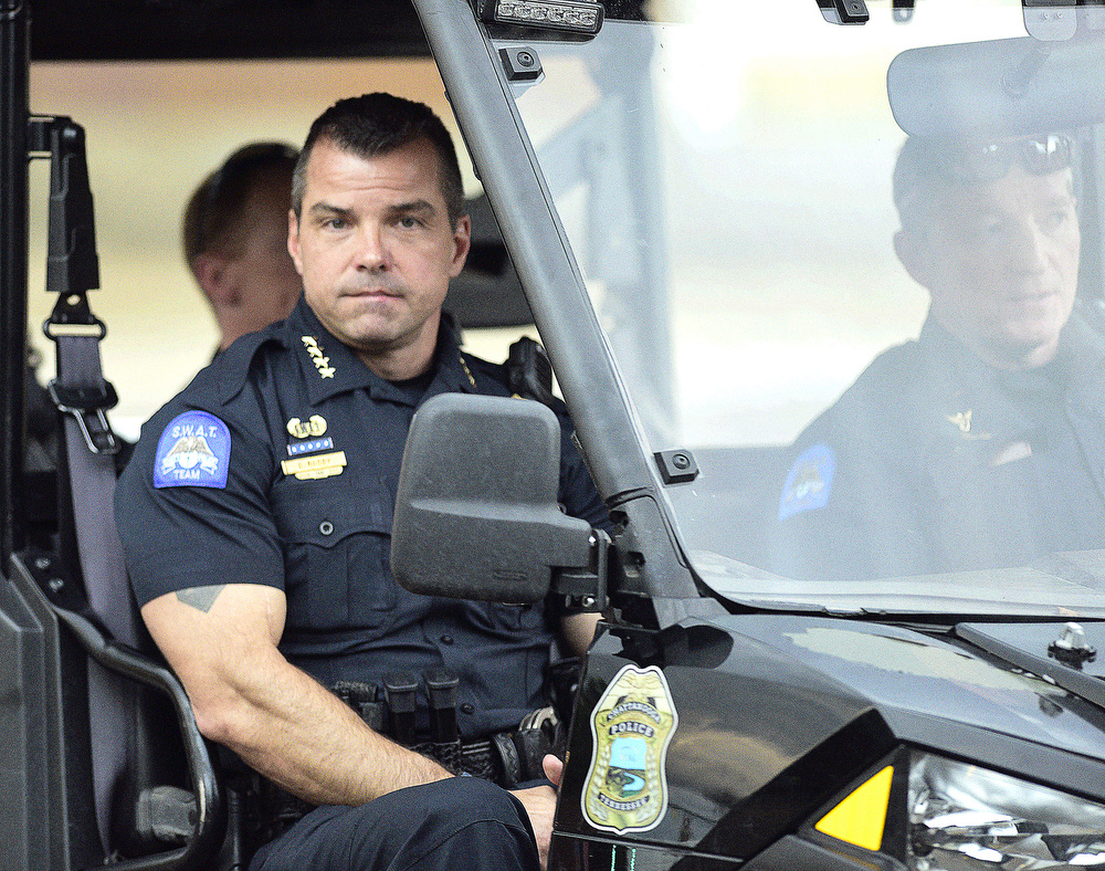 Staff Photo by Robin Rudd / Chattanooga Police Chief David Roddy, and other command personal, ride in a all-terrain vehicle a head of the march. Protesters gathered at Miller Park and marched south past some of Chattanooga's tourism icons in reaction to the killing of George Floyd and other police brutalities on June 17, 2020.