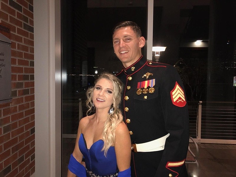 This photo provided by his family shows Sgt. Wolfgang "Wolf" K. Weninger with his girlfriend, Shannon Riggins, at the Marine Corps ball in 2019 near Camp Lejeune in North Carolina. On Friday, June 19, 2020, Weninger, 28, was set to graduate from the U.S. Army Airborne School at Ft. Benning, Ga., where he went to learn how to become a paratrooper. On Tuesday, June 16, he was killed during a training jump. (Family photo via AP)


