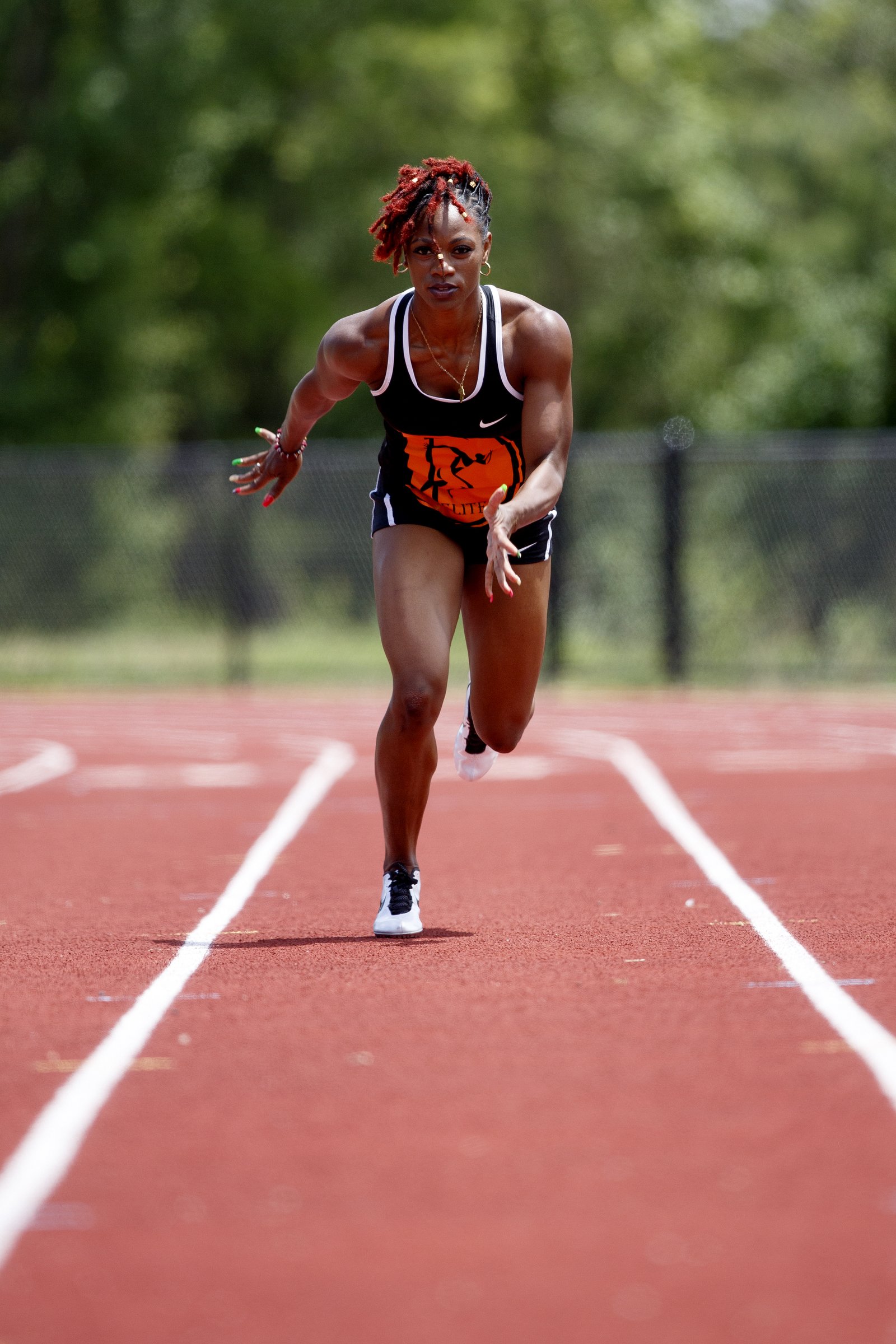 Staff photo by C.B. Schmelter / The arts of poetry and painting, as well as motherhood, have helped LaQuisha Jackson grow off the track, but the 26-year-old former Howard School and college star at San Diego State and Missouri has not given up her dream of running for the United States in the Olympics.