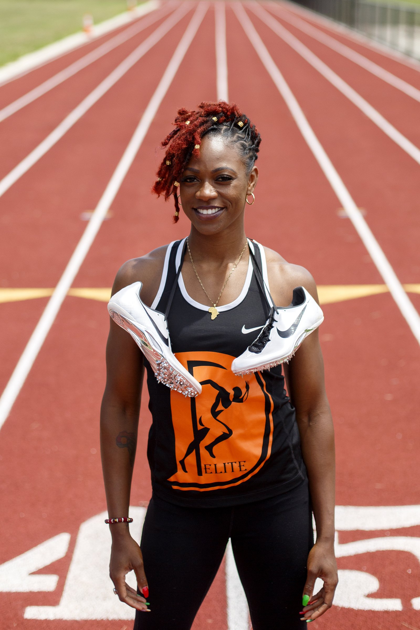 Staff photo by C.B. Schmelter / Former Howard track star LaQuisha Jackson poses Tuesday at Brainerd High School.