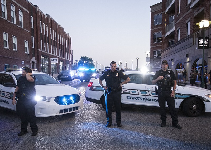 Staff photo by Troy Stolt / Chattanooga Police Chief David Roddy stands with other police officers on May 30 outside of a crowd blocking traffic at the intersection of Market Street and Frazier Avenue during protests over the death of George Floyd in custody of Minneapolis police officers.