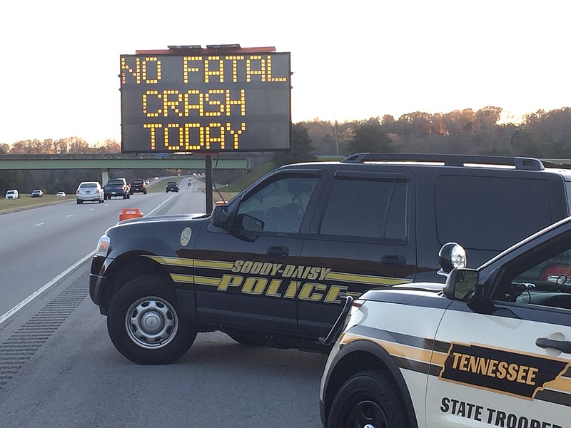 Tennessee Highway Patrol / A Soddy-Daisy police vehicle is parked next to a THP car.