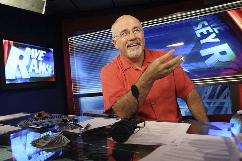 FILE-This July 29, 2009 file photo shows  financial guru Dave Ramsey in his broadcasting studio in Brentwood, Tenn. (AP Photo/Josh Anderson,File)