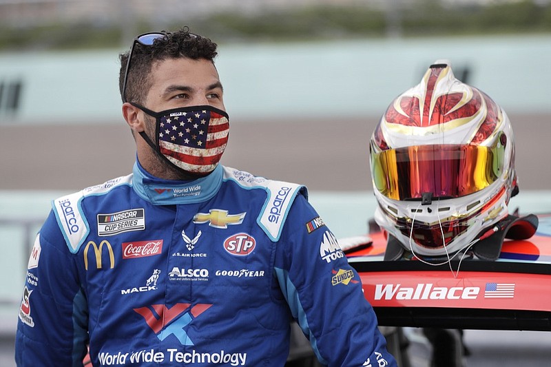 Bubba Wallace waits for the start of a NASCAR Cup Series auto race Sunday, June 14, 2020, in Homestead, Fla. (AP Photo/Wilfredo Lee)