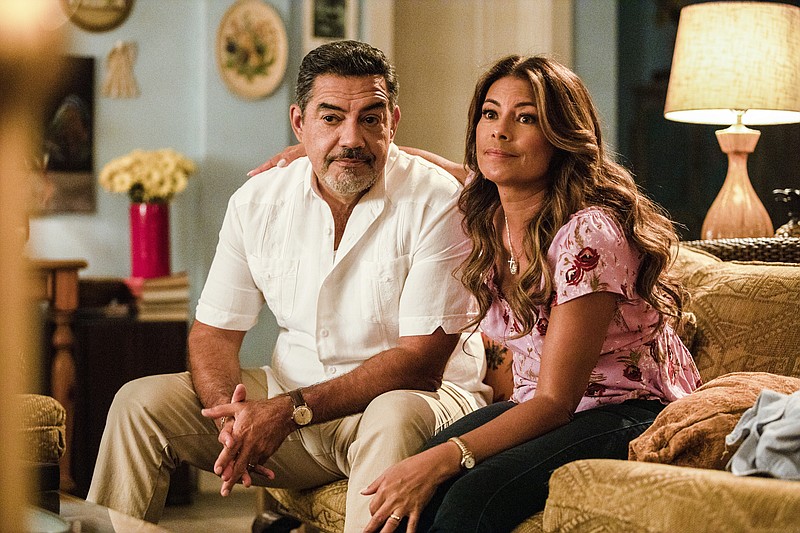 In this image released by ABC, Carlos Gomez, left, and Lisa Vidal appear in a scene from "The Baker and the Beauty." Fans have launched a petition drive to find the sitcom a new home after it was canceled by ABC. (Laura Magruder/ABC via AP)


