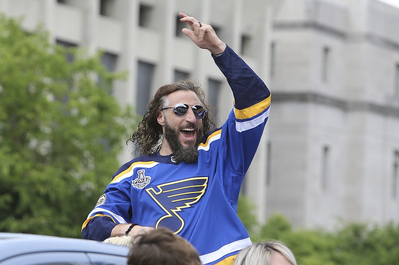 AP photo by Scott Kane / St. Louis Blues right wing Chris Thorburn waves to fans during the team's Stanley Cup victory celebration on June 15, 2019, in St. Louis. 