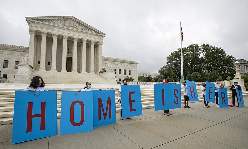 Photo by Manuel Balce Ceneta of The Associated Press / Deferred Action for Childhood Arrivals (DACA) students gather in front of the Supreme Court on Thursday, June 18, 2020, in Washington. The Supreme Court on Thursday rejected President Donald Trump's effort to end legal protections for 650,000 young immigrants.