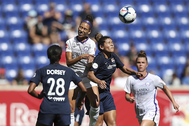 AP photo by Steve Luciano / Orlando Pride midfielder Kristen Edmonds, center left, and Sky Blue FC midfielder Raquel Rodriguez, center right, competed for a head during an NWSL match on Sept. 29, 2019, in Harrison, N.J.