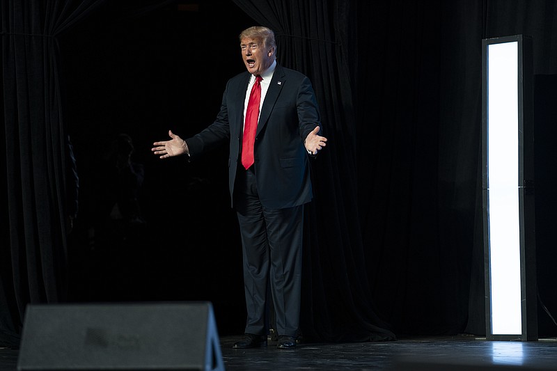 President Donald Trump arrives to speak to a group of young Republicans at Dream City Church, Tuesday, June 23, 2020, in Phoenix. (AP Photo/Evan Vucci)


