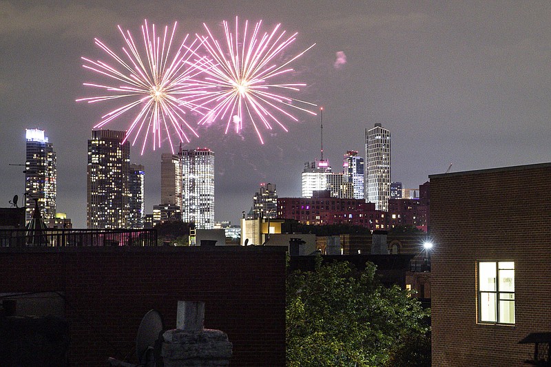 FILE - In this Friday, June 19, 2020 photo, fireworks explode during Juneteenth celebrations above the Bedford-Stuyvesant neighborhood in the Brooklyn borough of New York. The Manhattan skyline is seen in the background. They light up the sky in celebration, best known in the U.S. as a way to highlight Independence Day. This year, fireworks aren't being saved for special events. They've become a nightly nuisance from Connecticut to California, angering sleep-deprived citizens and alarming local officials. (AP Photo/John Minchillo, File)


