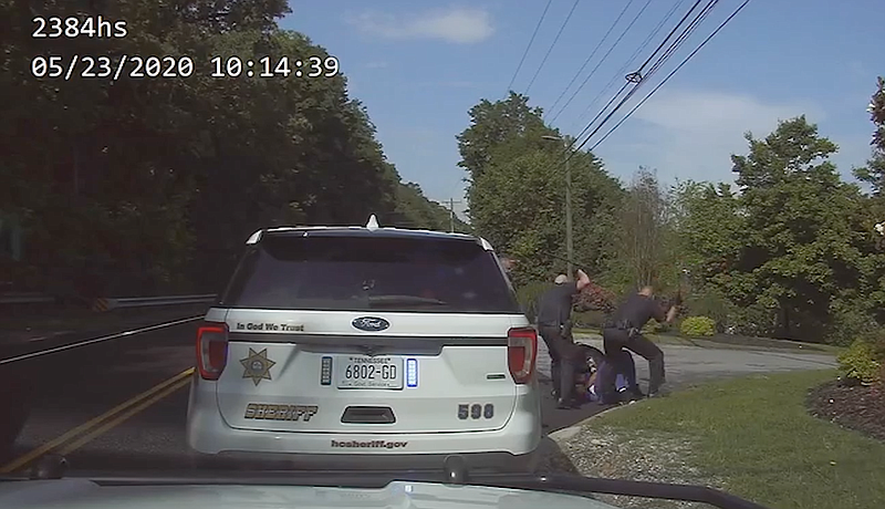 Hamilton County sheriff's deputies are seen beating 32-year-old Reginald Arrington Jr. with batons during an Ooltewah arrest on May 23, 2020, in this screenshot from dashboard camera footage.