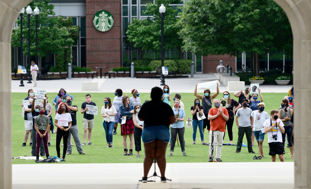 Staff Photo by Robin Rudd / UTC student Jennah Hyppolite, one of the student organizers of the event, speaks to the rally. UTC students and the Chattanooga community held a demonstration at the school's Chamberlain Field to show solidarity with Black Lives Matter.