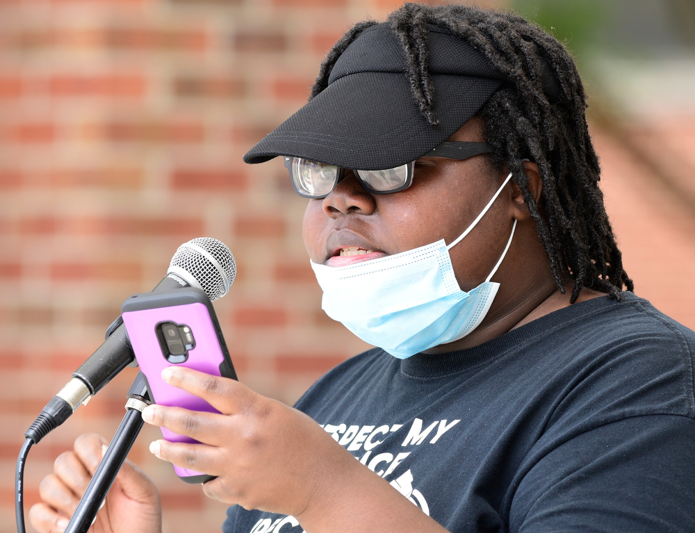 Staff Photo by Robin Rudd / UTC student Jennah Hyppolite, one of the student organizers of the event, speaks to the rally. UTC students and the Chattanooga community held a demonstration at the school's Chamberlain Field to show solidarity with Black Lives Matter.