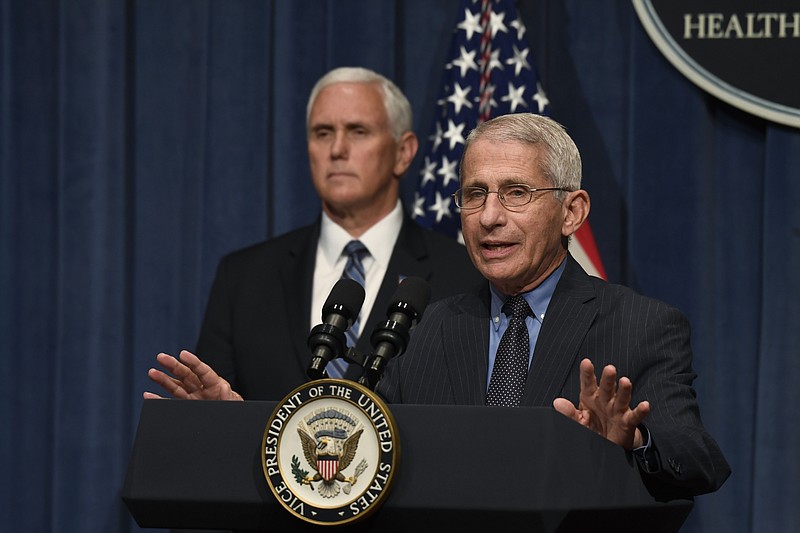 Dr. Anthony Fauci, right, director of the National Institute of Allergy and Infectious Diseases, speaks during a briefing with members of the Coronavirus Task Force, including Vice President Mike Pence, left, at the Department of Health and Human Services in Washington, Friday, June 26, 2020. (AP Photo/Susan Walsh)


