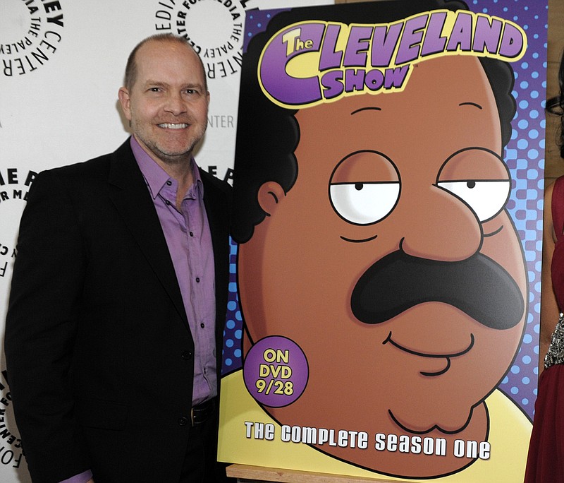 FILE - In this Sept. 23, 2010 file photo, actor and show co-creator Mike Henry appears with signage for his animated series "The Cleveland Show" at a panel discussion at The Paley Center for Media in Beverly Hills, Calif. The show was a spin-off from the long-running series "Family Guy." Henry, announced Friday, June 26, that he will no longer voice the black character Cleveland Brown on "Family Guy." The spin-off series was canceled after its fourth season in 2013. (AP Photo/Dan Steinberg, File)


