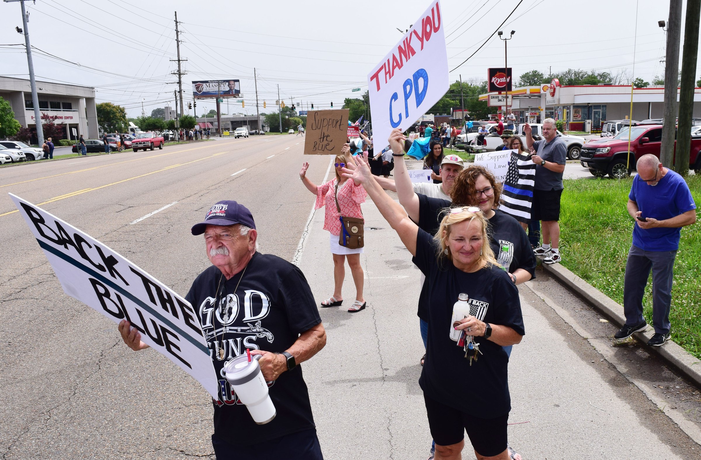 Staff Photo by Robin Rudd / People gathered, June 27, 2020, along Amnicola Highway, in front of the Chattanooga Police Services Building, to rally in support of area police.