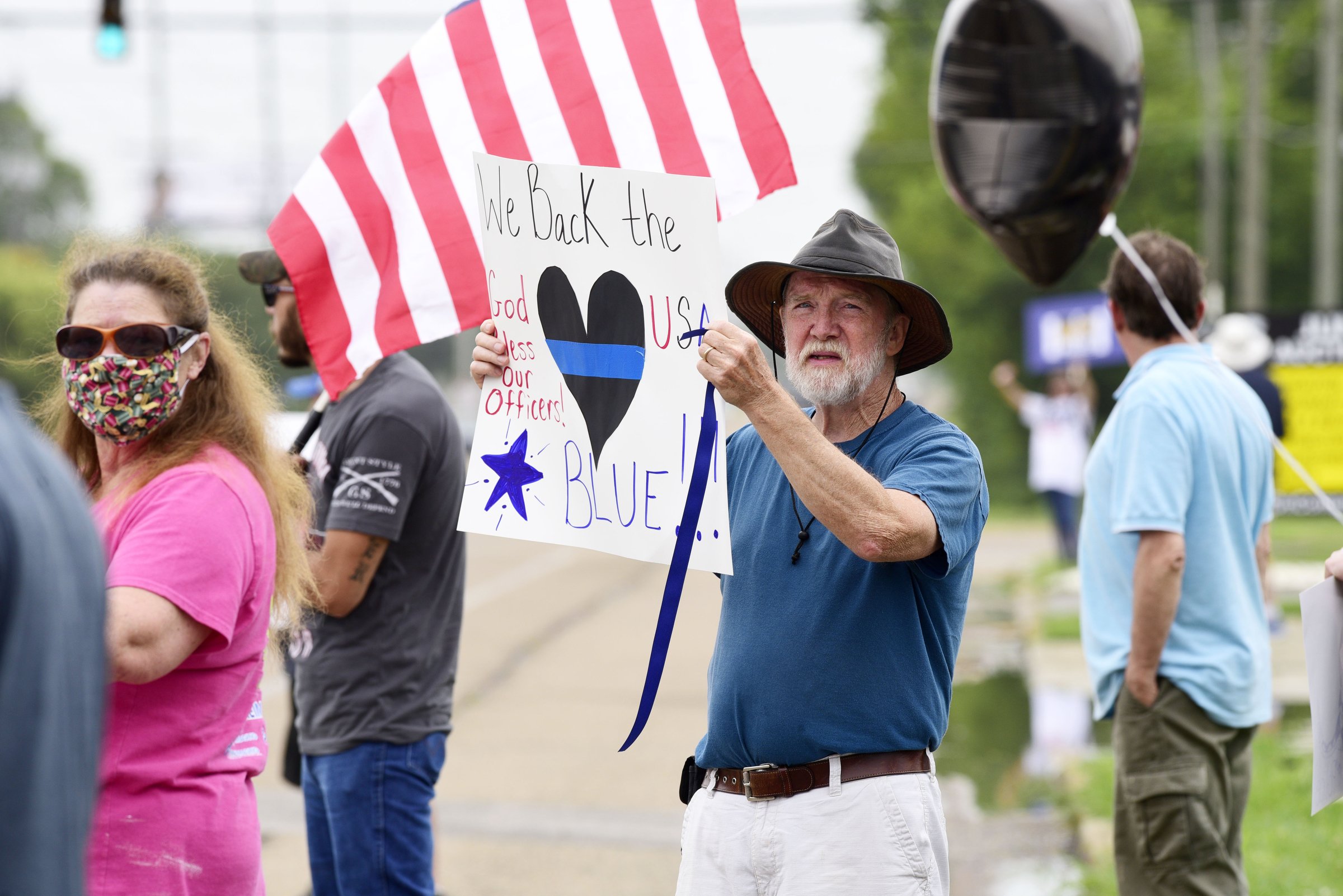 Staff Photo by Robin Rudd / People gathered, June 27, 2020, along Amnicola Highway, in front of the Chattanooga Police Services Building, to rally in support of area police.