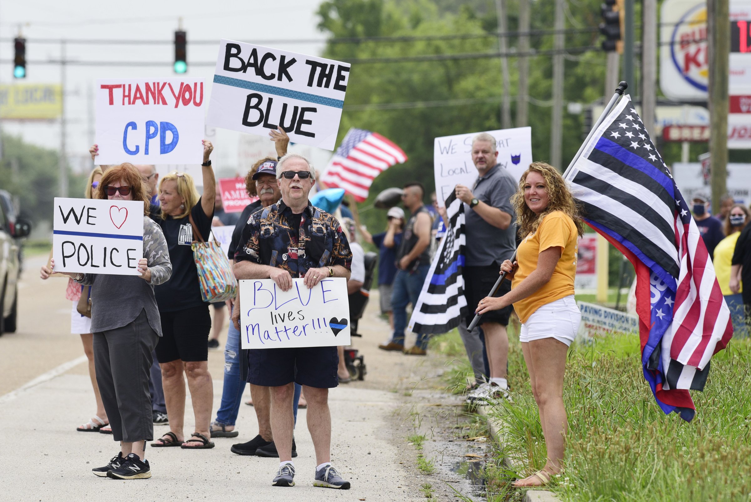 Staff Photo by Robin Rudd / People gathered, June 27, 2020, along Amnicola Highway, in front of the Chattanooga Police Services Building, to rally in support of area police.