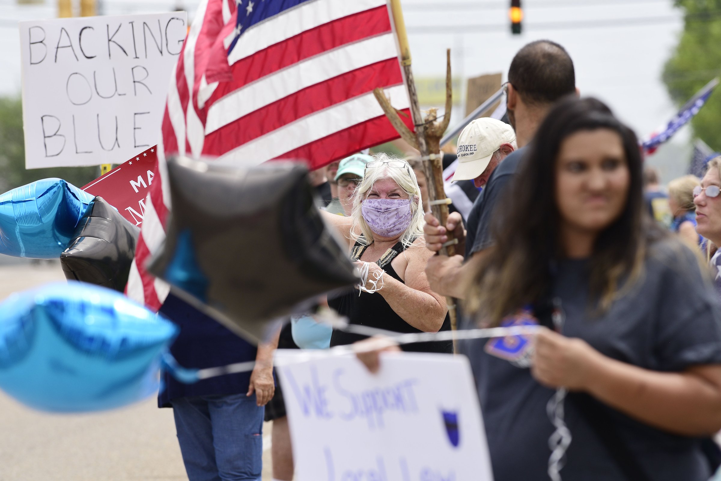 Staff Photo by Robin Rudd / People gathered, June 27, 2020, along Amnicola Highway, in front of the Chattanooga Police Services Building, to rally in support of area police.