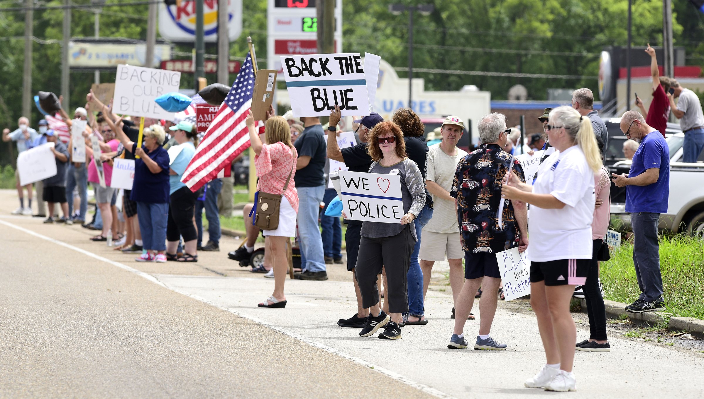 Staff Photo by Robin Rudd / People gathered, June 27, 2020, along Amnicola Highway, in front of the Chattanooga Police Services Building, to rally in support of area police.