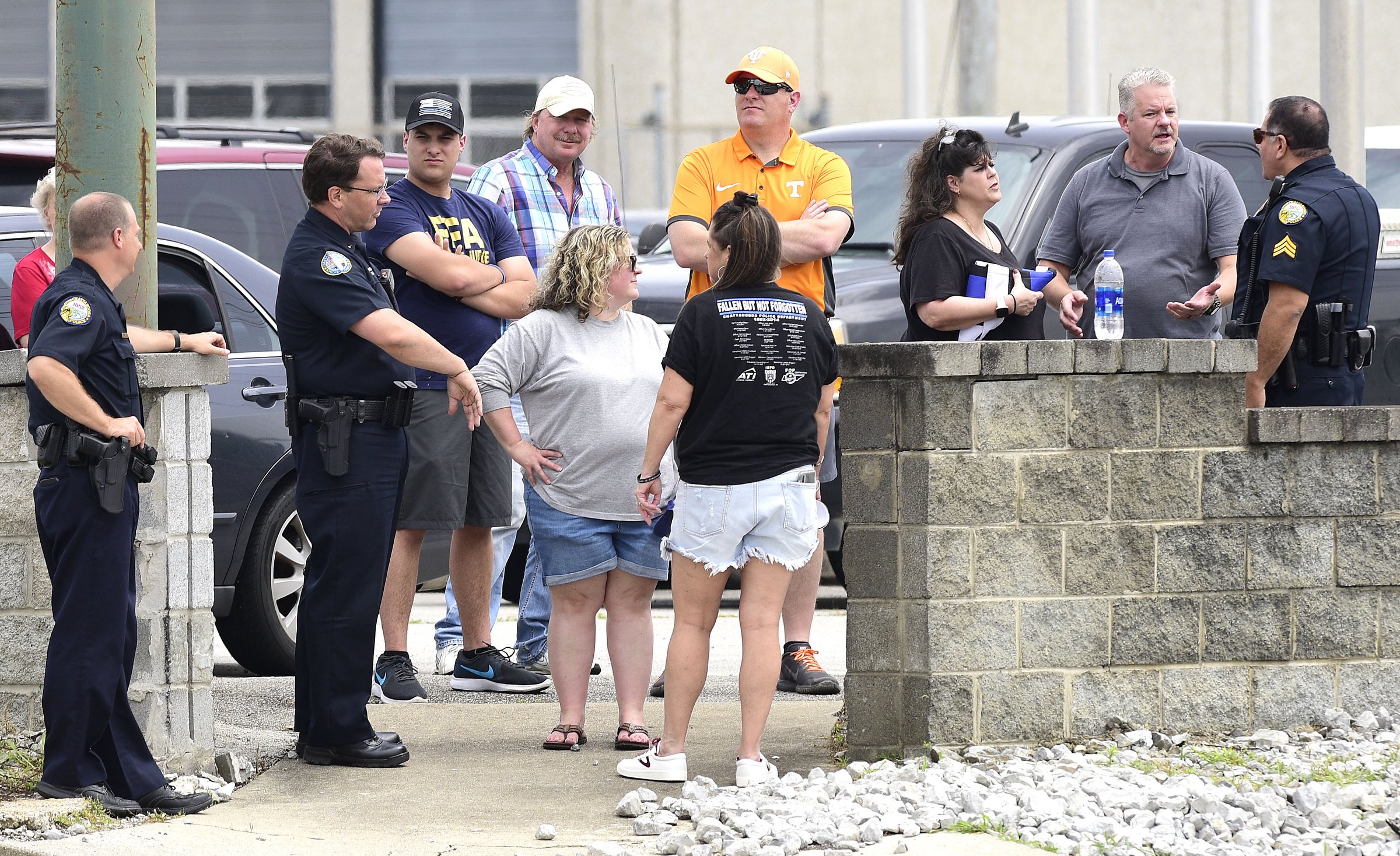 Staff Photo by Robin Rudd / Chattanooga Police officers speak to supporters. People gathered, June 27, 2020, along Amnicola Highway, in front of the Chattanooga Police Services Building, to rally in support of area police.