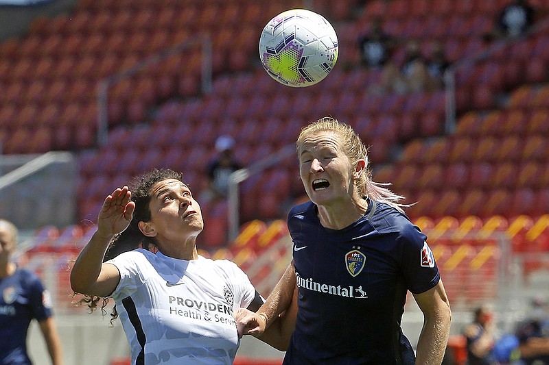 AP photo by Rick Bowmer / Portland Thorns FC midfielder Rocky Rodriguez, left, and North Carolina Courage midfielder Samantha Mewis, right, battle for the ball during the second half of the opening match of the NWSL Challenge Cup on Saturday at Zions Bank Stadium in Herriman, Utah,