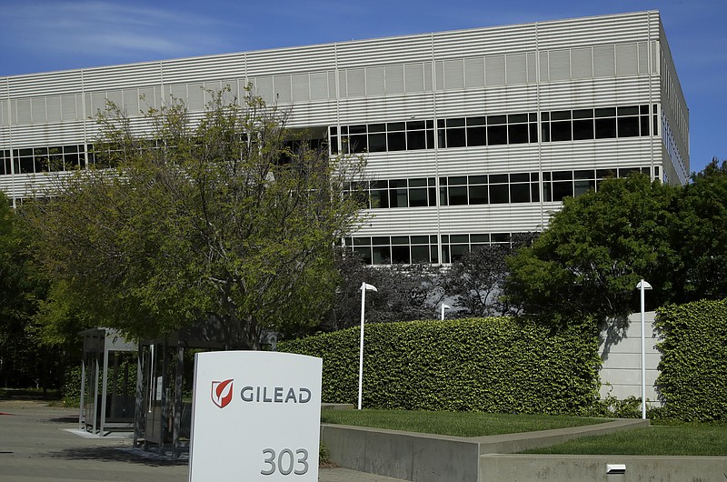 FILE - This is an April 30, 2020, file photo showing Gilead Sciences headquarters in Foster City, Calif. The maker of a drug shown to shorten recovery time for severely ill COVID-19 patients says it will charge $2,340 for a typical treatment course for people covered by government health programs in the United States and other developed countries. Gilead Sciences announced the price Monday, June 29 for remdesivir, and said the price would be $3,120 for patients with private insurance. It will sell for far less in poorer countries where generic drugmakers are being allowed to make it. (AP Photo/Ben Margot, File)