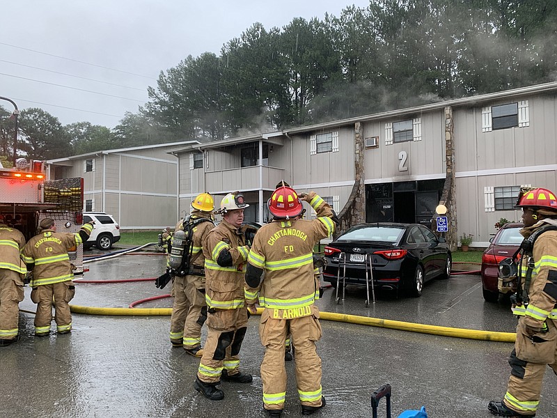 Chattanooga firefighters are seen responding to the scene of an afternoon apartment building fire at the Rustic Village North Apartments on Sunflower Lane on Tuesday, June 30, 2020. / Photo provided by the Chattanooga Fire Department