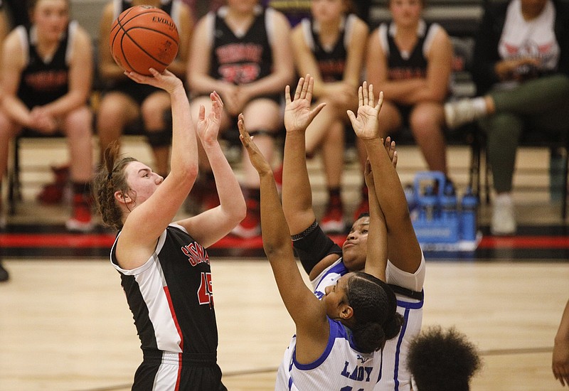 Staff photo by Troy Stolt / Signal Mountain's Olivia Koontz shoots during the District 6-AA girls' basketball championship game against visiting Red Bank on Feb. 25.