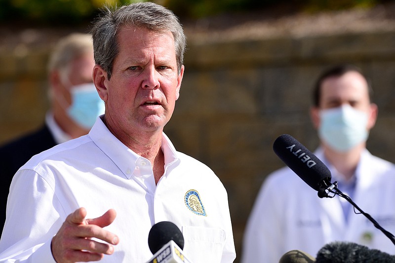 Staff Photo by Robin Rudd / Georgia Governor Brian Kemp speaks about the importance of mask wearing during the COVID-19 pandemic.  Gov. Brian Kemp was in Dalton Thursday morning, along with U.S. Surgeon General Jerome Adams as part of his statewide "Wear a Mask" tour. He's going around to different COVID hot spots and urging people to wear masks. 