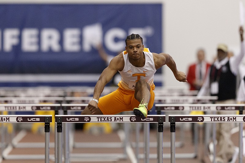 Tennessee Athletics photo by Maury Neipris / Tennessee's Eric Parker clears a hurdle during the second day of the SEC indoor track and field championship meet at Gilliam Indoor Track Stadium in College Station, Texas, this past February.
