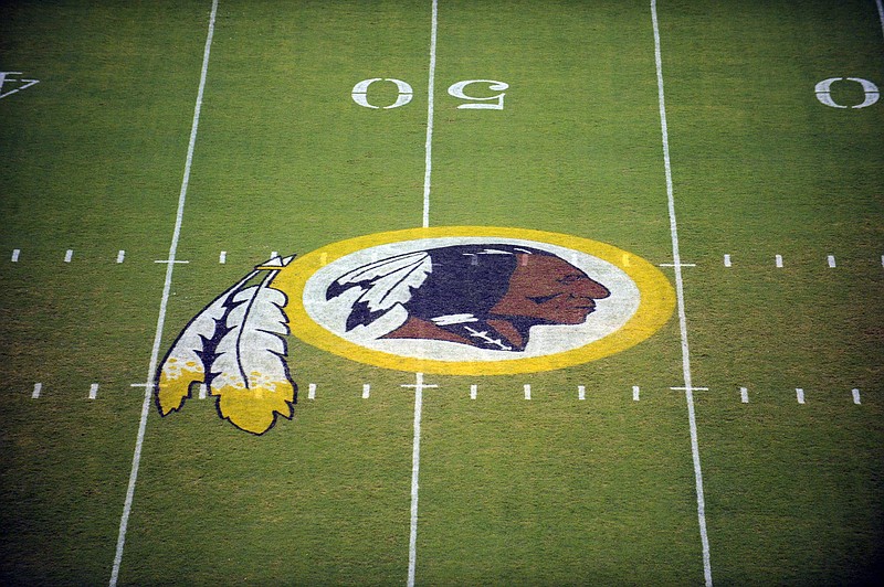AP file photo by Nick Wass / Washington Redskins logo