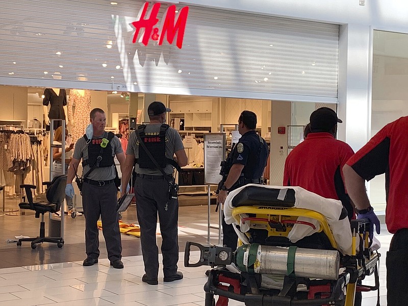 Authorities continue their investigation of a shooting at Riverchase Galleria shopping mall, Friday, July 3, 2020, in Hoover, Ala., that left an 8-year-old boy dead and three other people hospitalized. (Carol Robinson/The Birmingham News via AP)


