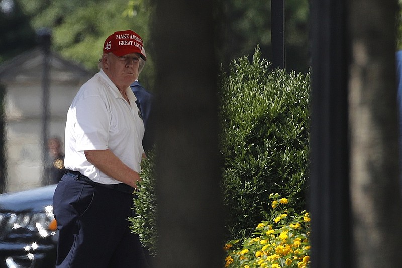 AP photo by Patrick Semansky / U.S. President Donald Trump arrives at the White House on July 5 after visiting Trump National Golf Club in Sterling, Va.