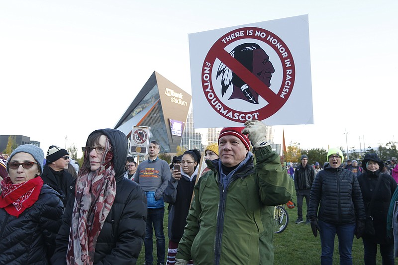 AP photo by Bruce Kluckhohn / Native American leaders protest against the Washington Redskins' team name outside U.S. Bank Stadium before a game against the Minnesota Vikings on Oct. 24, 2019.