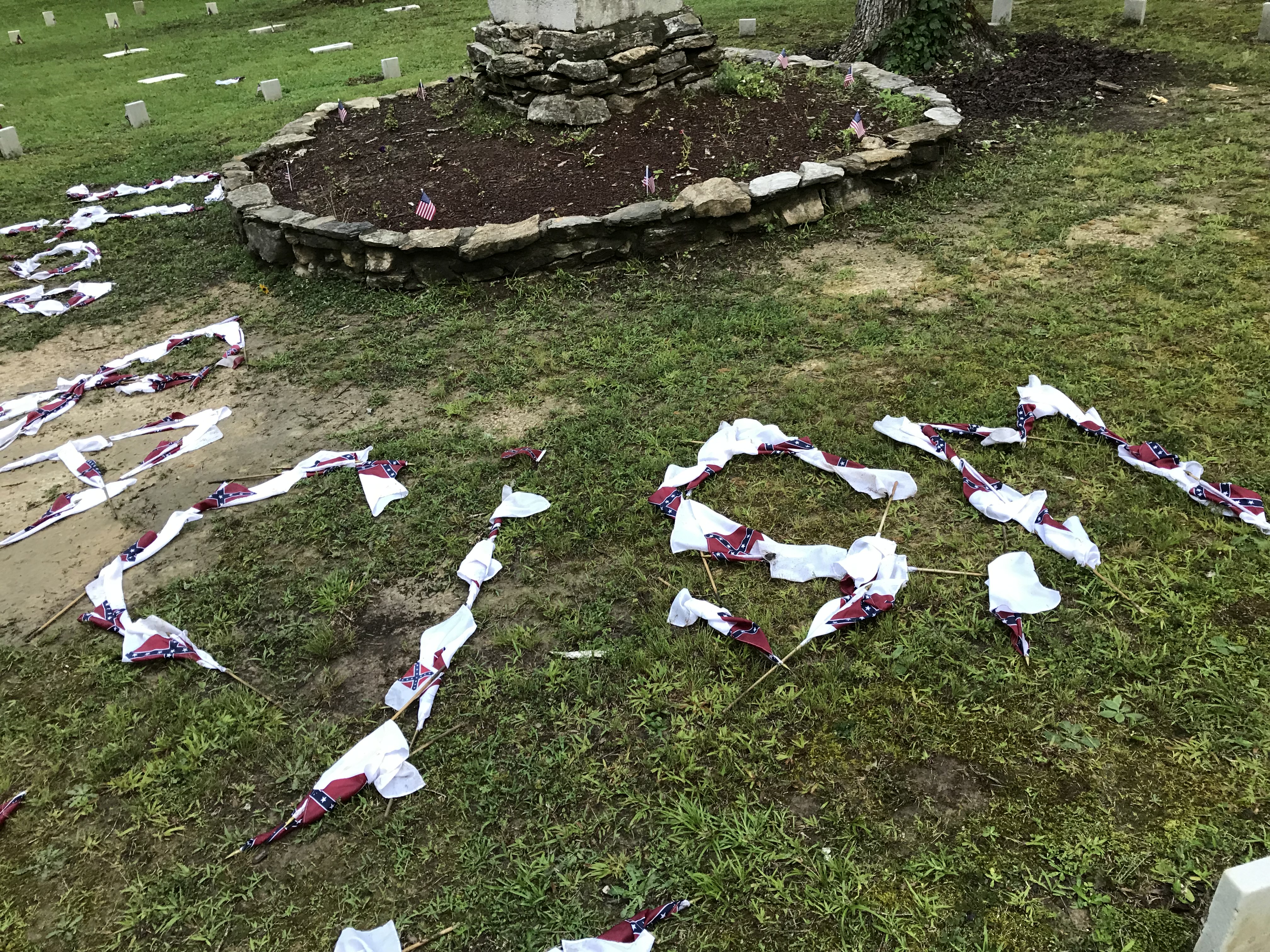Photo contributed by the Gordon County Sheriffs Office / Small Confederate flags displayed at the Resaca Confederate Cemetery to spell "STOP RACISM."