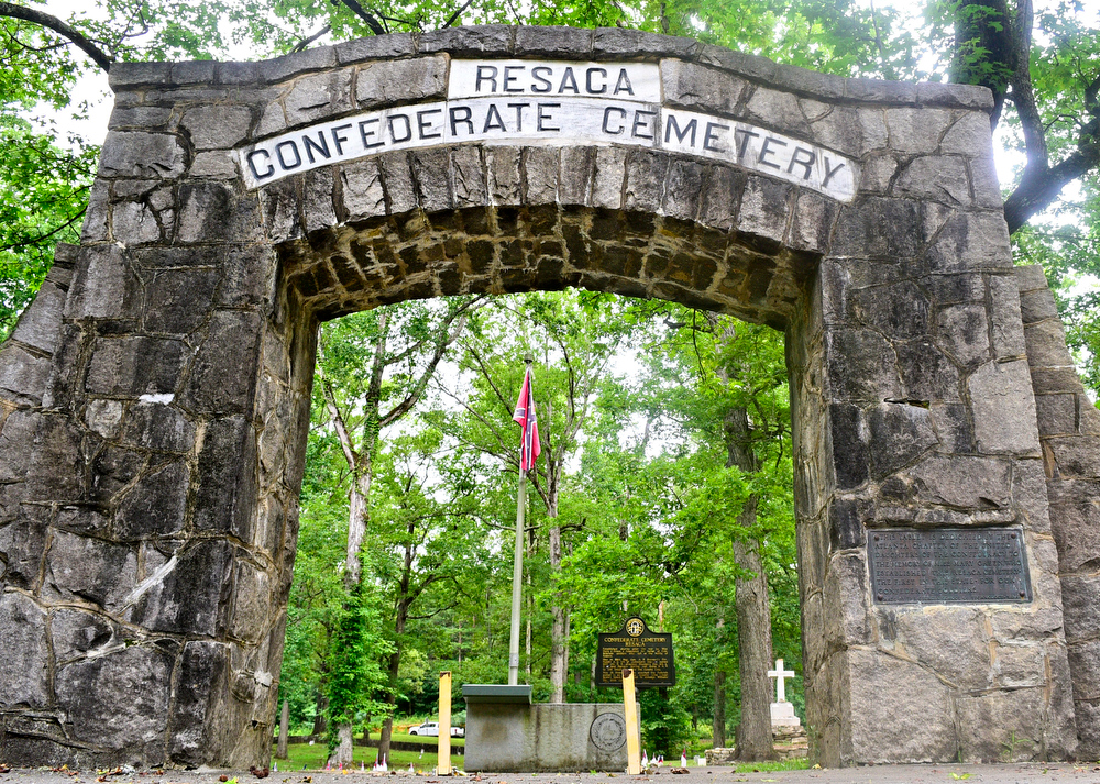 Staff Photo by Robin Rudd / A stone arch marks the entrance to the Resaca Confederate Cemetery. The site is the burial place of over 450 Confederate soldiers who died during the Battle of Resaca which took place May 14 and 15, 1864. Some of the soldiers were identified but 424 graves are marked "unknown".