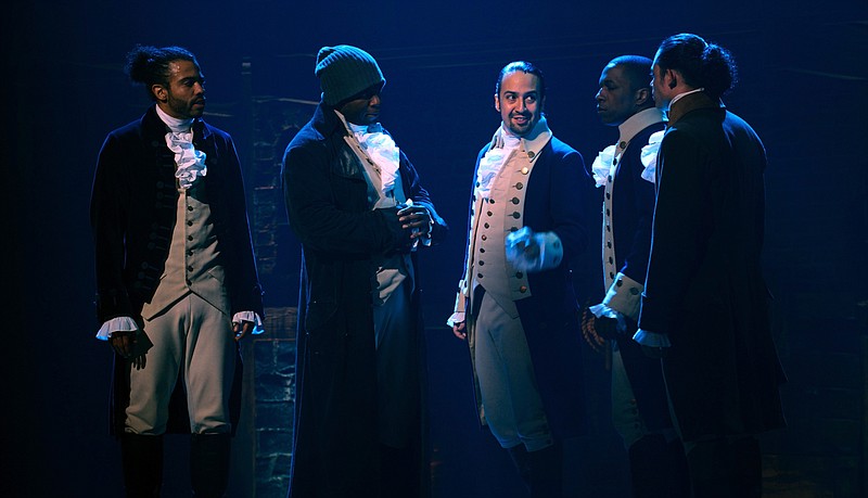 In this image released by Disney Plus, from left, Daveed Diggs, Okieriete Onaodowan, Lin-Manuel Miranda, Leslie Odom Jr. and Anthony Ramos appear in a filmed version of the original Broadway production of "Hamilton." (Disney Plus via AP)


