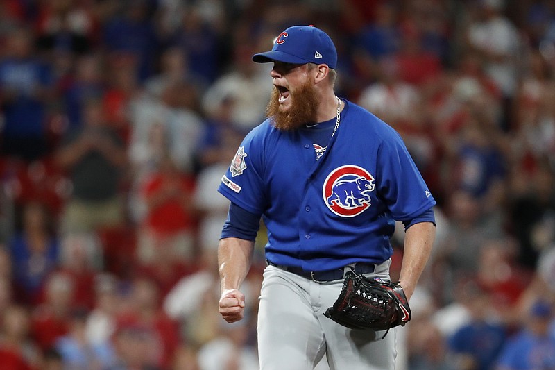 AP photo by Jeff Roberson / Chicago Cubs relief pitcher Craig Kimbrel celebrates after striking out the St. Louis Cardinals' Yairo Munoz for the final out on July 31, 2019, in St. Louis.