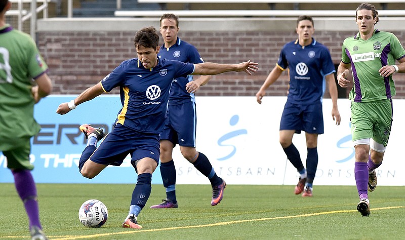 Staff file photo by Robin Rudd CFC's Jose "Zeca" Ferraz (9) scores a goal in the first half. The New Orleans Jesters visited the Chattanooga Football Club in soccer action at Finley Stadium on June 15, 2017.