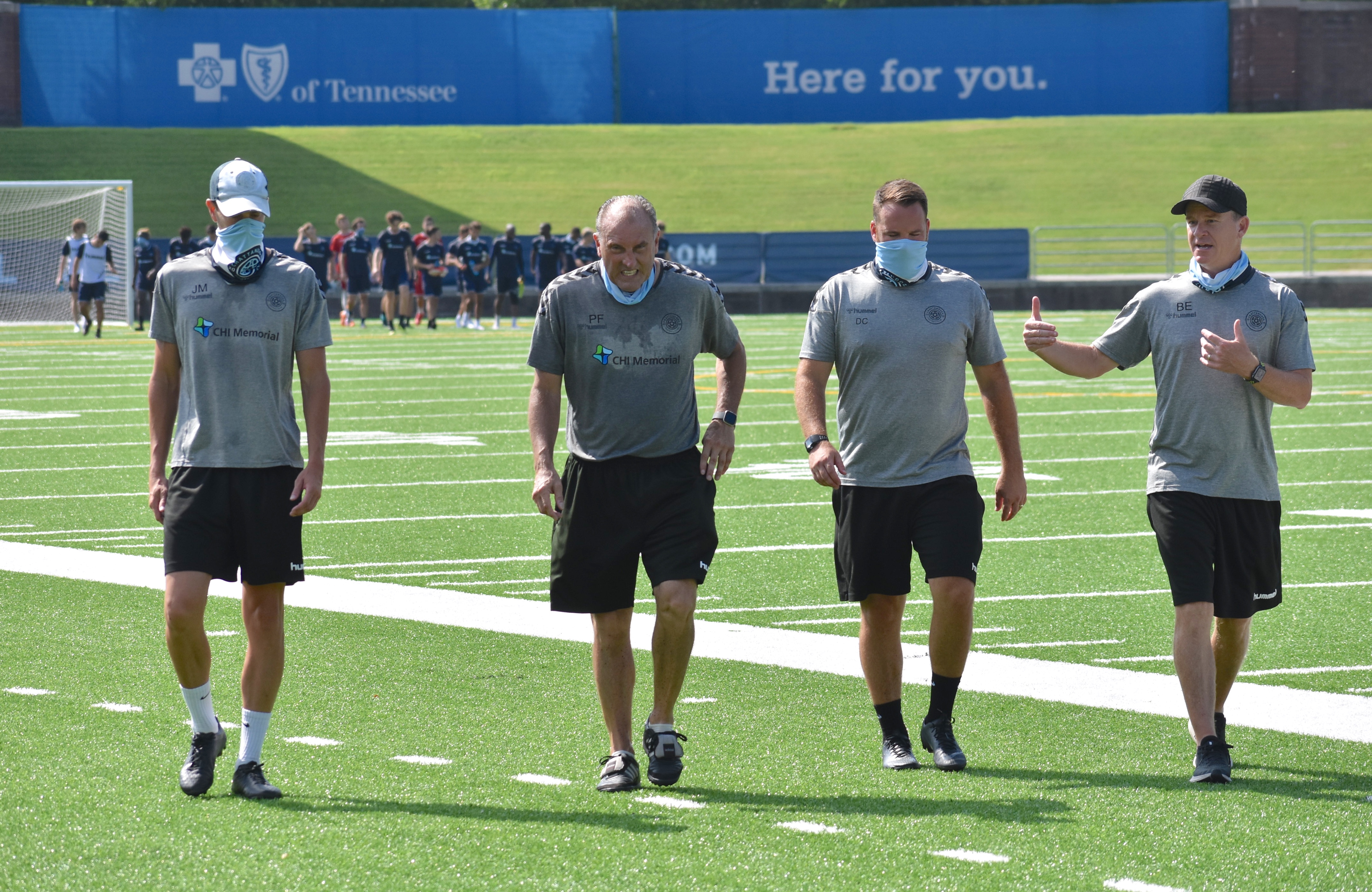 Staff photo by Patrick MacCoon / Chattanooga Football Club's coaching staff walks off the field after Thursday's practice at Finley Stadium. On Saturday, CFC will host its first professional match of the season against the Georgia Revolution in the NISA Independent Cup.