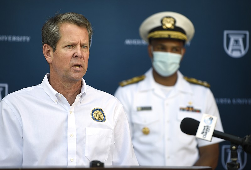 Georgia Gov. Brian Kemp speaks at the Georgia Cancer Center in Augusta, Ga., Thursday, July 2, 2020, as part of his "Wear a Mask" Fly-Around Tour to promote the wearing of masks as COVID numbers rise in Georgia. (Michael Holahan/The Augusta Chronicle via AP)