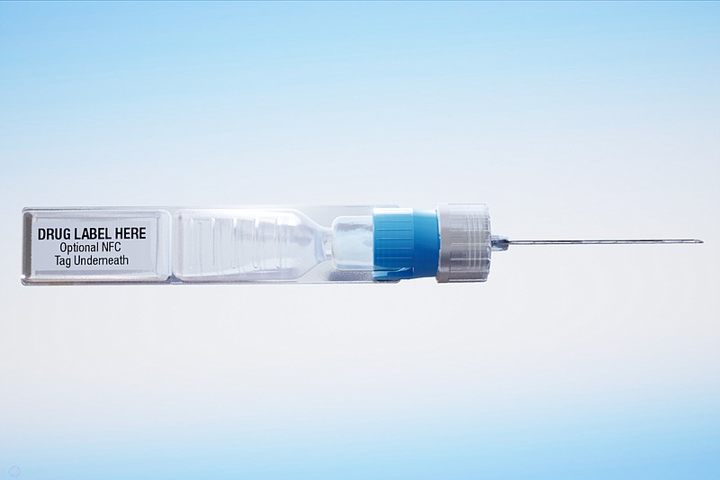 This undated image provided by ApiJect Systems America in July 2020 shows a prototype of their "BFS" prefilled syringe. The devices are self-contained: the soft plastic blister is squeezed to push a dosage through the attached needle to inject into a patient. It also includes a computer chip that can transmit information about the drug, dose, location and time of administration. When precious vats of COVID-19 vaccine are finally ready, the ability to jab the lifesaving solution into the arms of Americans will require hundreds of millions of injections. The Trump administration  has agreed to invest more than half a billion in tax dollars in ApiJect Systems America, a young company whose injector is not approved by federal health authorities and who hasn't yet set up a factory to manufacture the unapproved devices. (ApiJect Systems America via AP)


