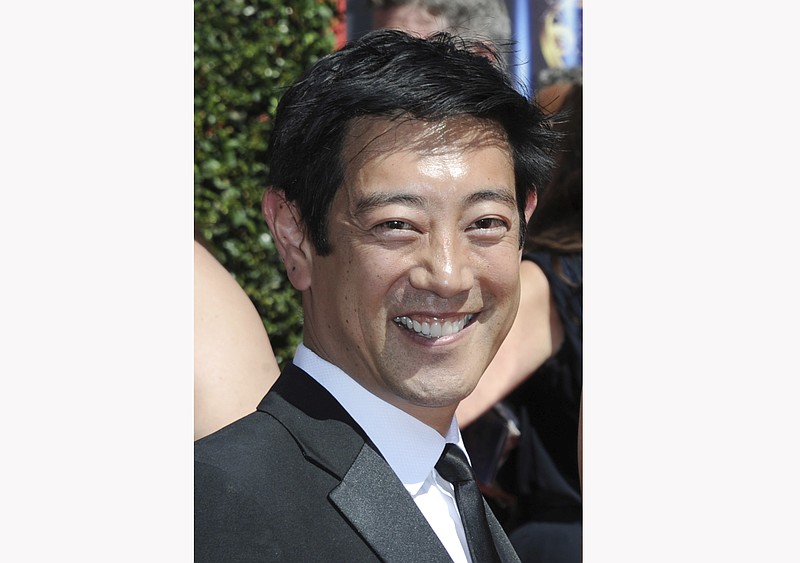 FILE - In this Aug. 16, 2014 file photo, Grant Imahara arrives at the Creative Arts Emmys in Los Angeles. Discovery Channel says the longtime "Mythbusters" host died from a brain aneurysm Monday at the age of 49. The network said he was one of the few trained operators for the famed R2-D2 droid from Star Wars and engineered the Energizer Bunny's popular rhythmic beat. (Photo by Richard Shotwell/Invision/AP, File)


