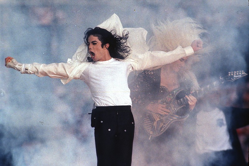 In this Feb. 1, 1993, file photo, Michael Jackson performs during the halftime show at the Super Bowl in Pasadena, Calif. A month-long Michael Jackson channel on SiriusXM satellite radio was announced Wednesday, July 15, 2020, by the singer's estate. The channel will feature music from Jackson's albums and from live performances, including his 1988 concerts at London's Wembley Stadium on his Bad Tour. (AP Photo/Rusty Kennedy, File)