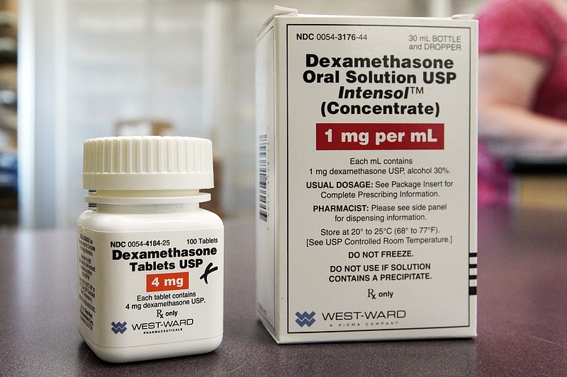 FILE - This Tuesday, June 16, 2020 file photo shows a bottle and box for dexamethasone in a pharmacy in Omaha, Neb. On Friday, July 17, 2020, British researchers published a report on the only drug shown to improve survival -- the inexpensive steroid dexamethasone. Two other studies found that the malaria drug hydroxychloroquine does not help people with only mild coronavirus symptoms. (AP Photo/Nati Harnik)


