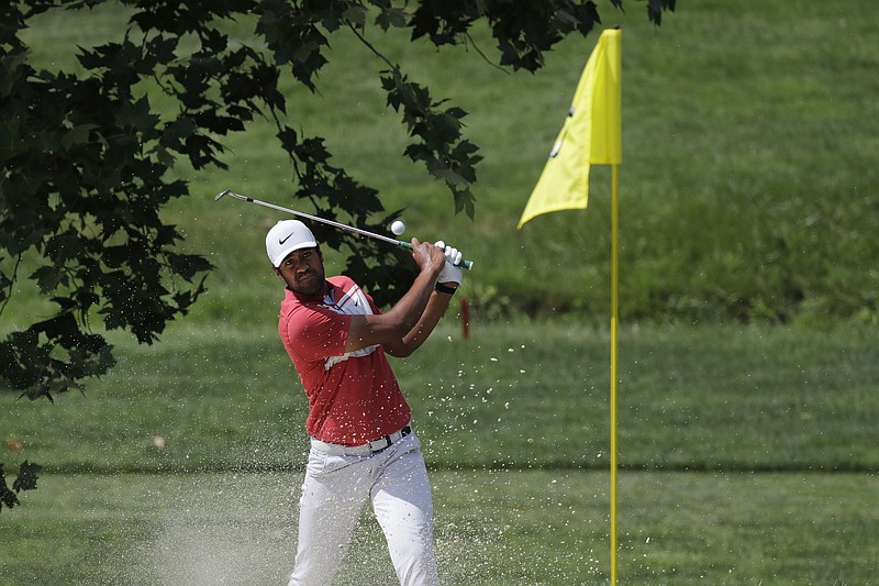 AP photo by Darron Cummings / Tony Finau hits from a bunker and toward the fourth green at Muirfield Village Golf Club during the second round of the PGA Tour's Memorial Tournament on Friday in Dublin, Ohio.