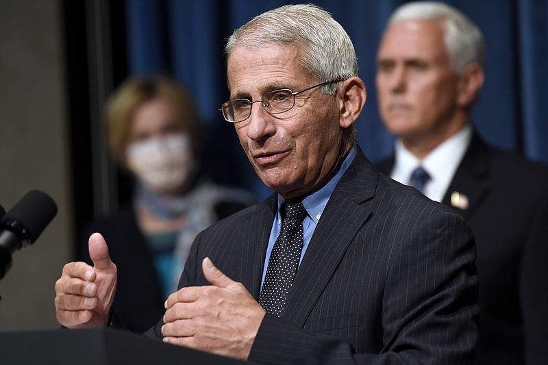 FILE - In this June 26, 2020, file photo Director of the National Institute of Allergy and Infectious Diseases Dr. Anthony Fauci, center, speaks as Vice President Mike Pence, right, and Dr. Deborah Birx, White House coronavirus response coordinator, left, listen during a news conference with members of the Coronavirus task force at the Department of Health and Human Services in Washington. Fauci has warned that the United States could soon see 100,000 infections per day. "We haven't even begun to see the end of it yet," Fauci said during a talk hosted by Stanford University's School of Medicine. (AP Photo/Susan Walsh, File)


