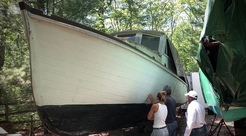 This July 20, 2020 photo provided by David Bigelow in Vineyard Haven, Mass. shows part of a boat that is being retrofitted to replicate the boat from the movie Jaws. A group of ocean lovers and movie buffs is building a replica of the boat, the Orca, for use as a conservation tool. (David Bigelow via AP)


